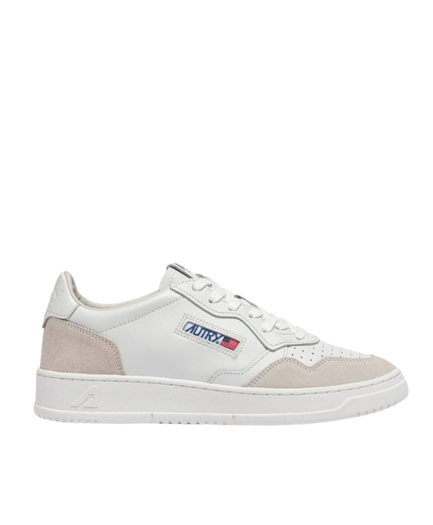 Autry Medalist sneakers in white with suede overlays, perforated toe, and rubber sole.