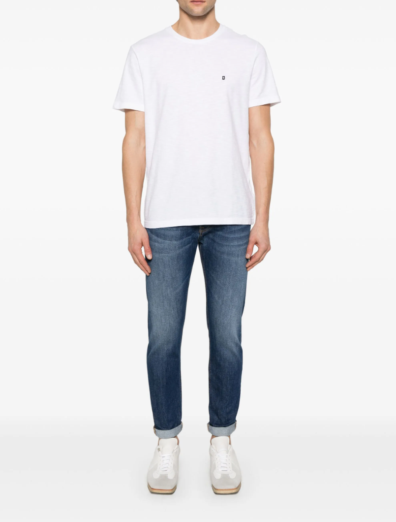 Dondup Icon jeans in indigo blue with button fly, five-pocket design, and logo patch.