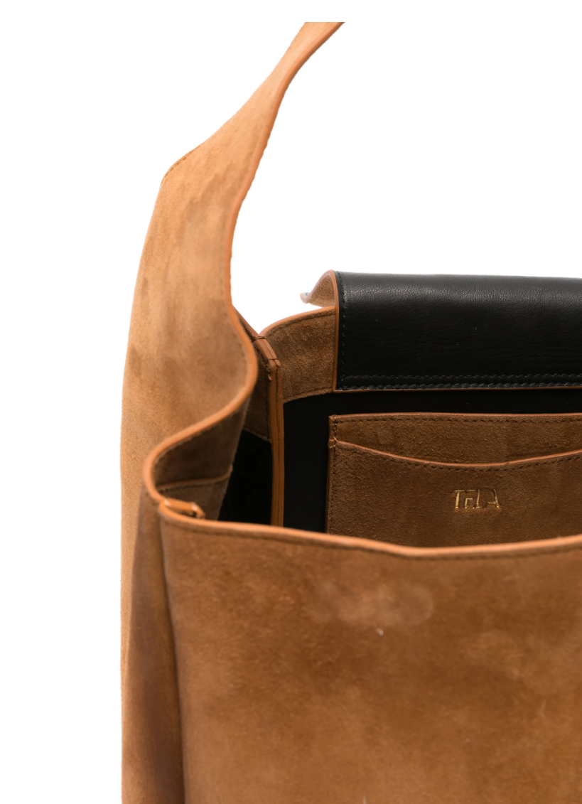 Tela suede bucket bag in tobacco brown with square shape and soft goat leather.
