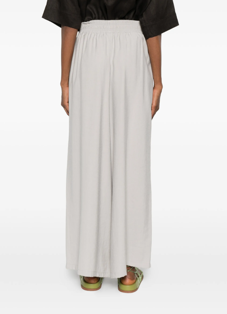 Drykorn CEILING trousers in drizzle with relaxed fit, low waist, and fluid modal fabric.