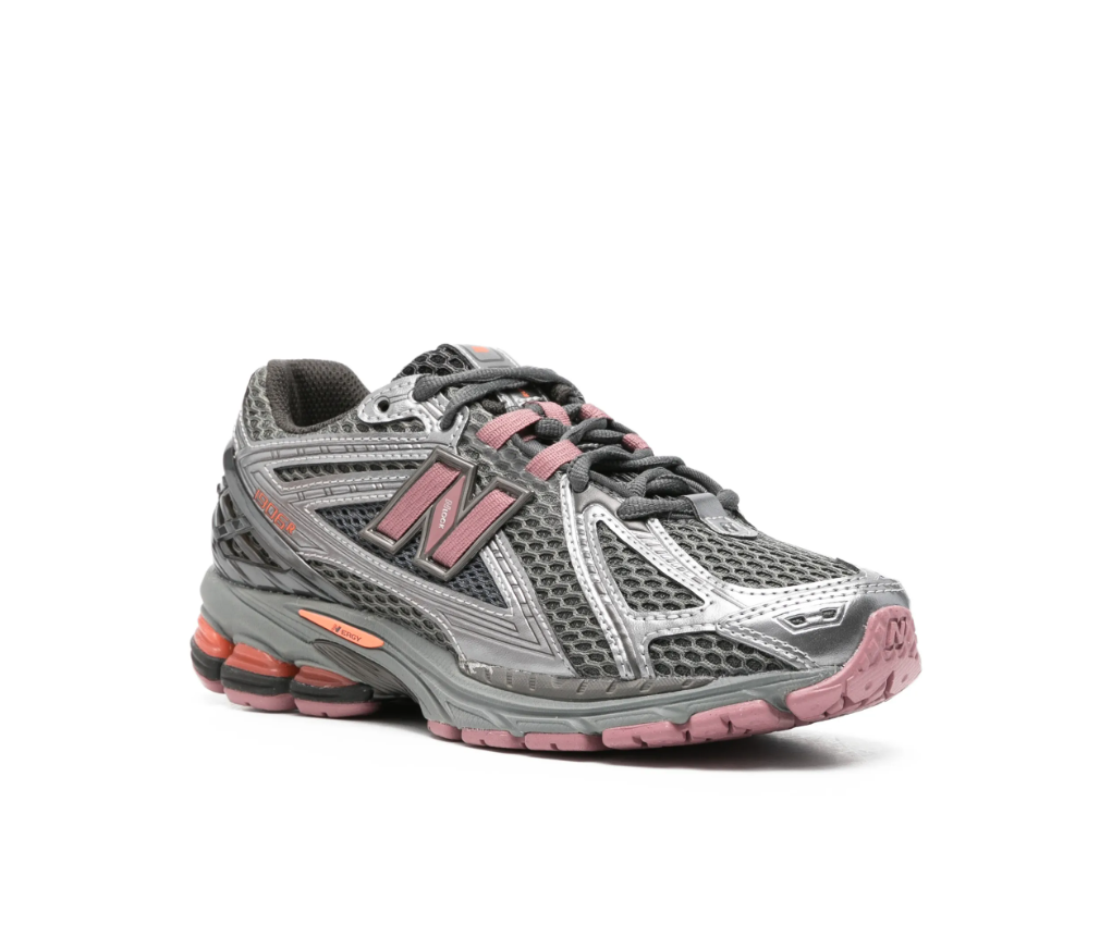 New Balance 1906R sneakers in rosewood with mesh panels, logo patch, and chunky sole.