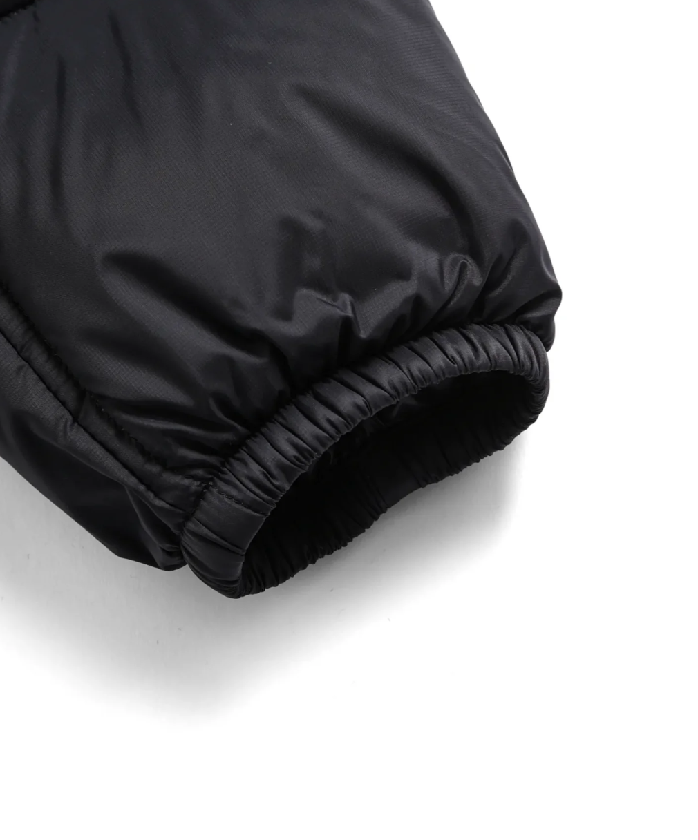 TAION Unisex Mountain Packable Volume Down Hood Coat in black with 800FP down and included storage bag.