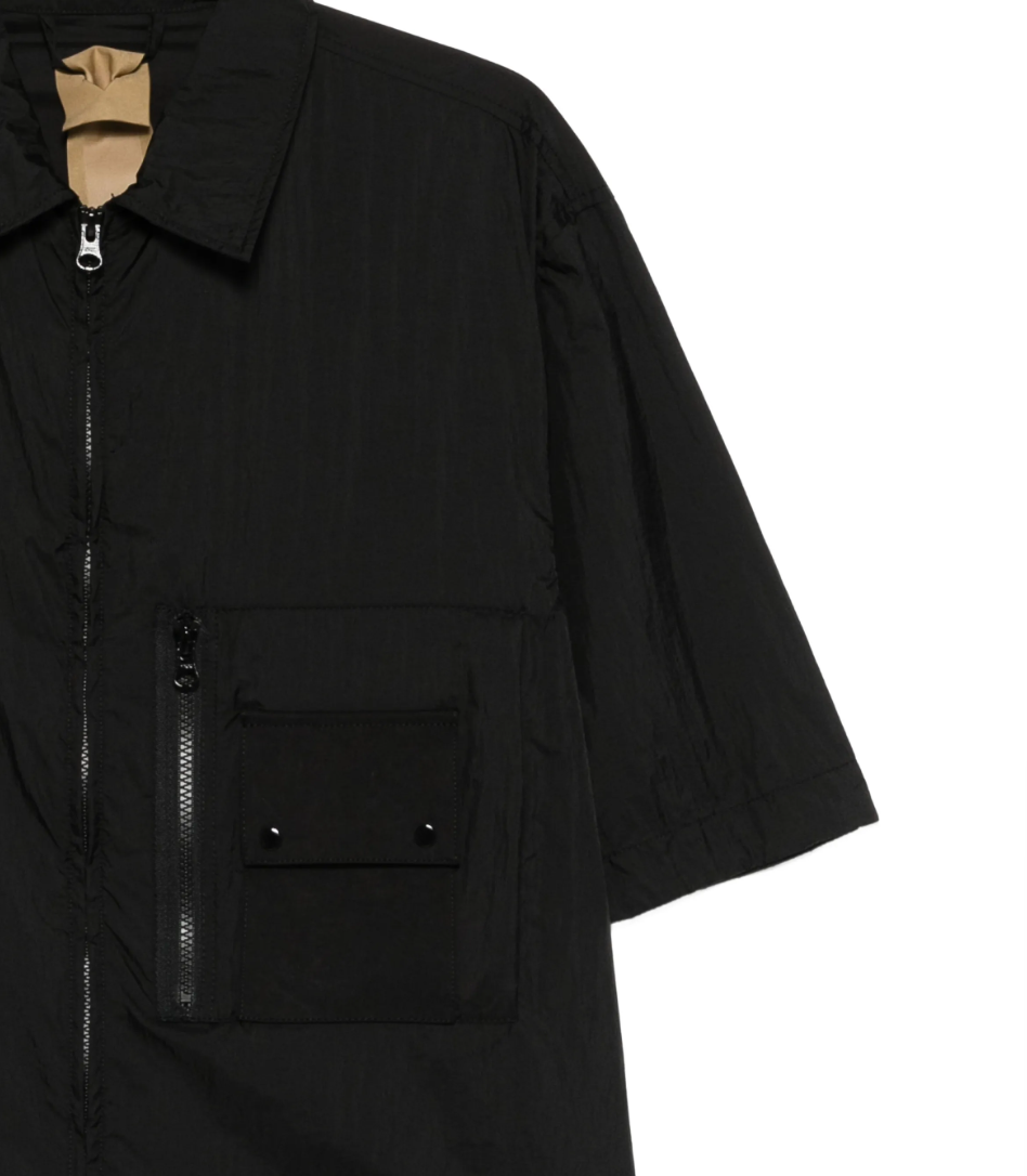 Ten C lightweight overshirt in black with zip closure, ripstop fabric, and utility pocket details.