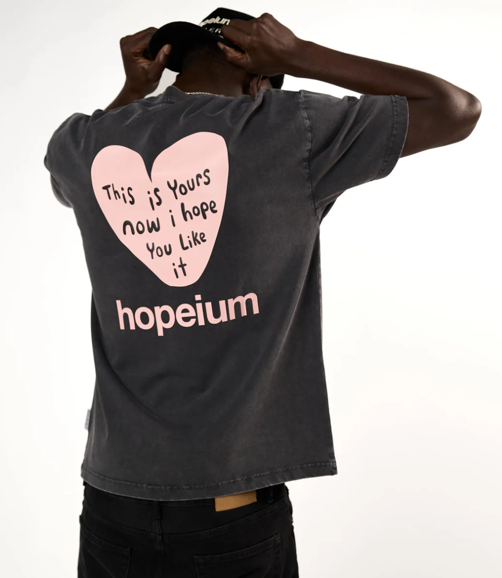 HOPEIUM men’s “THIS IS YOURS NOW” T-shirt in washed grey with heart print, logo detail, and oversized fit.
