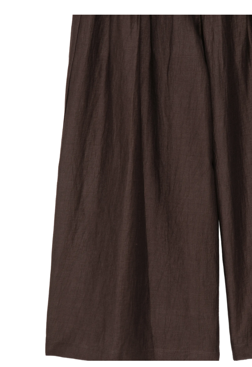 Brown pleated wide-leg trousers by Tela, made in Italy with belt loops and rear buttoned flap pockets for refined tailoring.