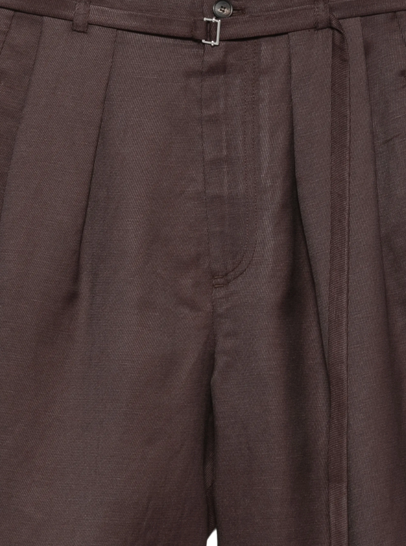 Brown pleated shorts by Tela, made in Italy with high waist and belt loops for a refined, tailored summer look.