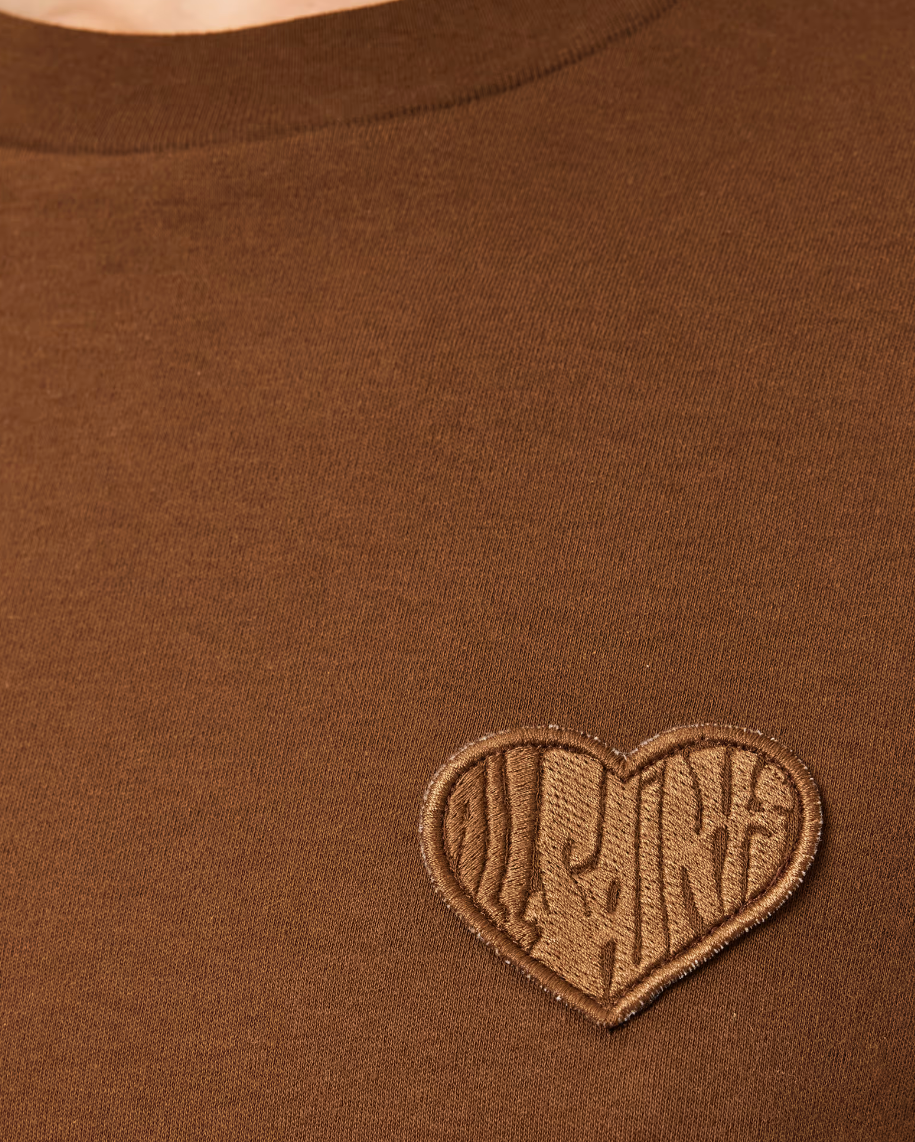 AllSaints LOVER Lisa Embroidered T-shirt in cognac brown with crew neck, short sleeves, embroidered heart patch, and signature logo.