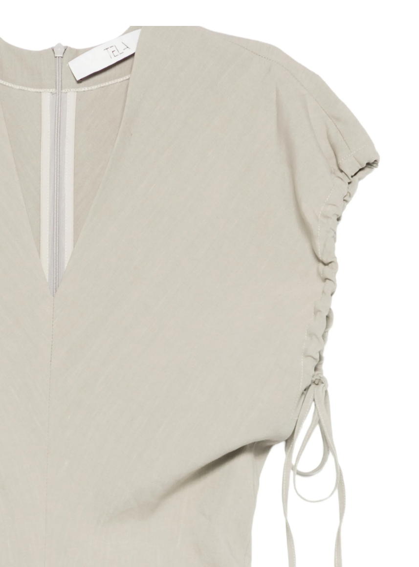 Grey V-neck midi dress by Tela, made in Italy with drawstring waist, back zipper, and subtle slit for elegant, versatile styling.