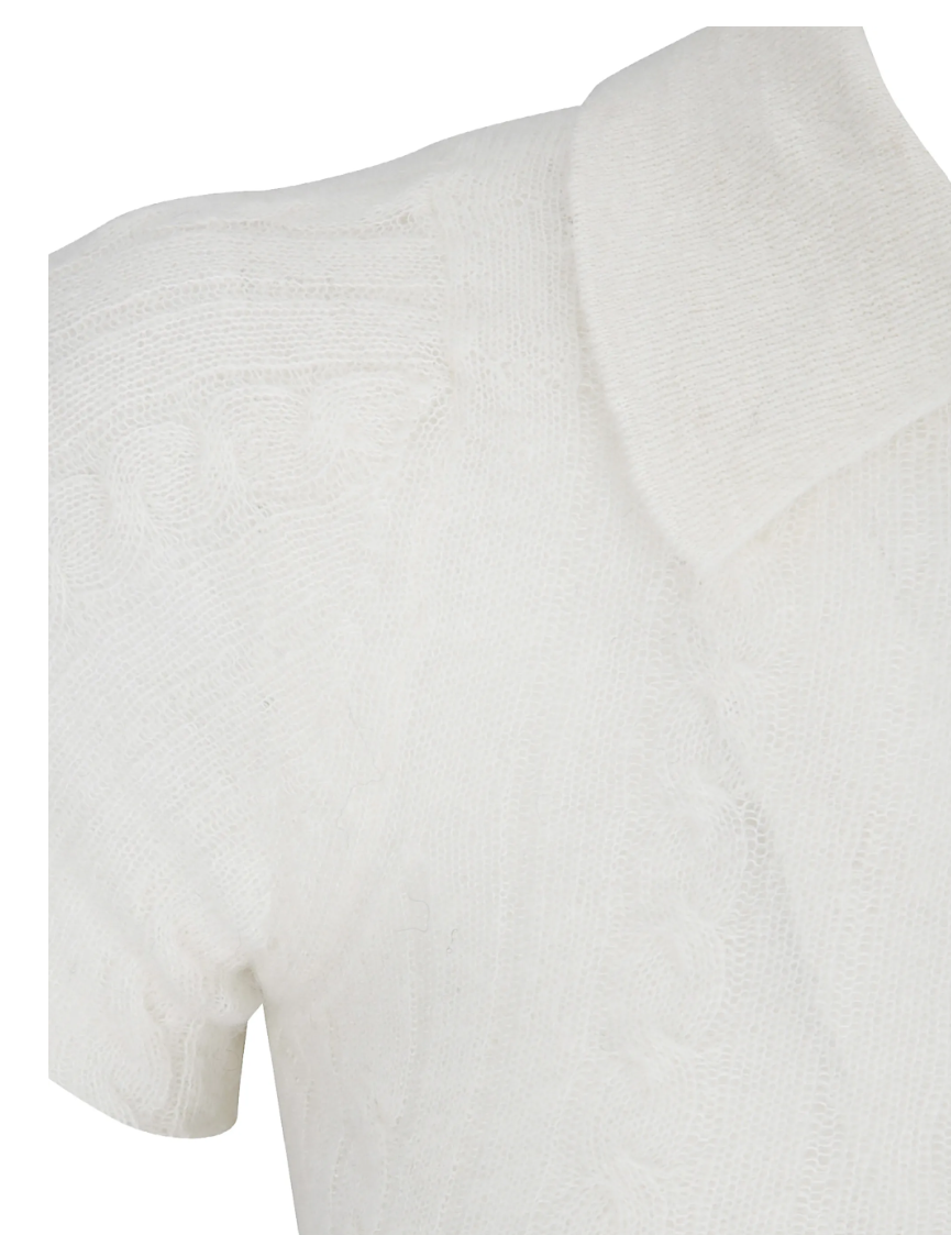 HAIKURE LAURIE Knit Polo Shirt in Butter featuring a semi-sheer finish, polo collar, button closure and raw-edge detailing.