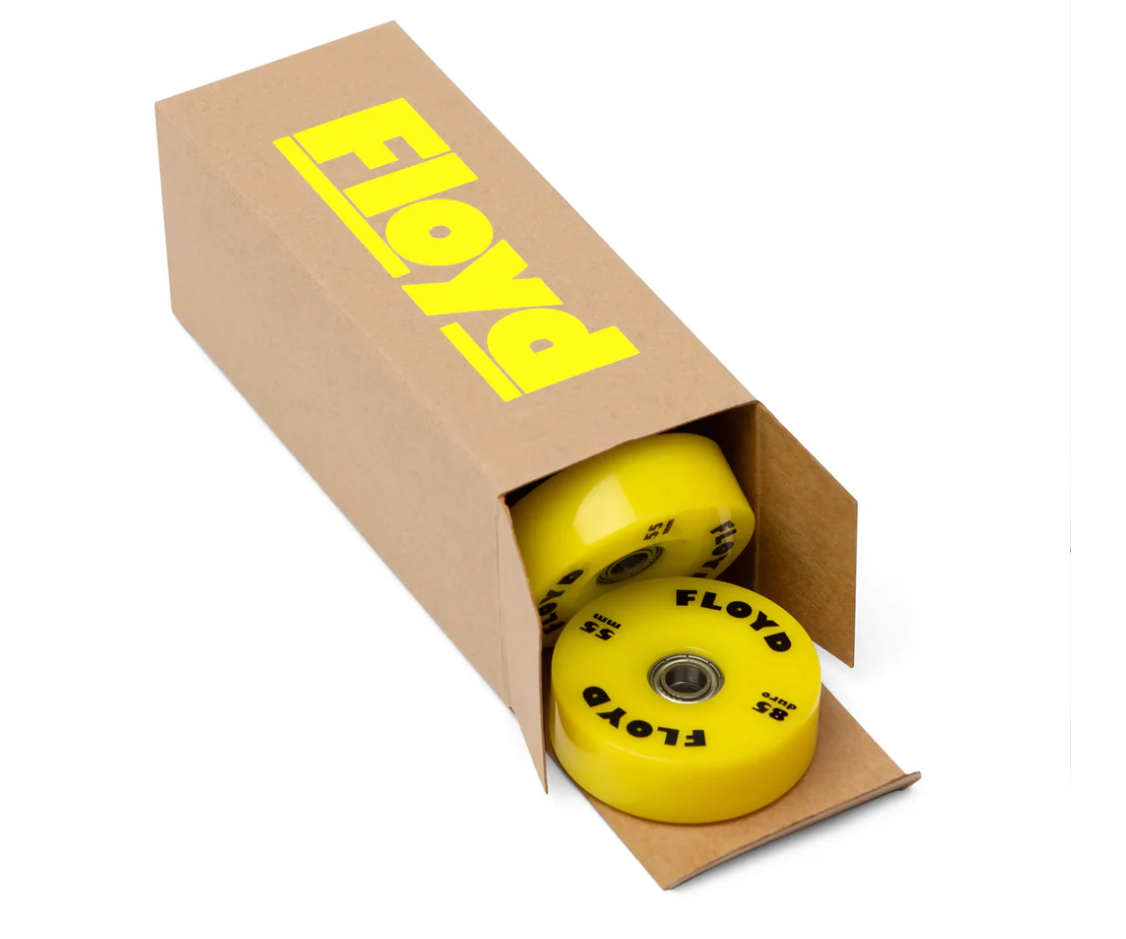 FLOYD wheel set in Monster Yellow with 8 polyurethane skateboard wheels and ABEC-7 bearings for smooth travel.