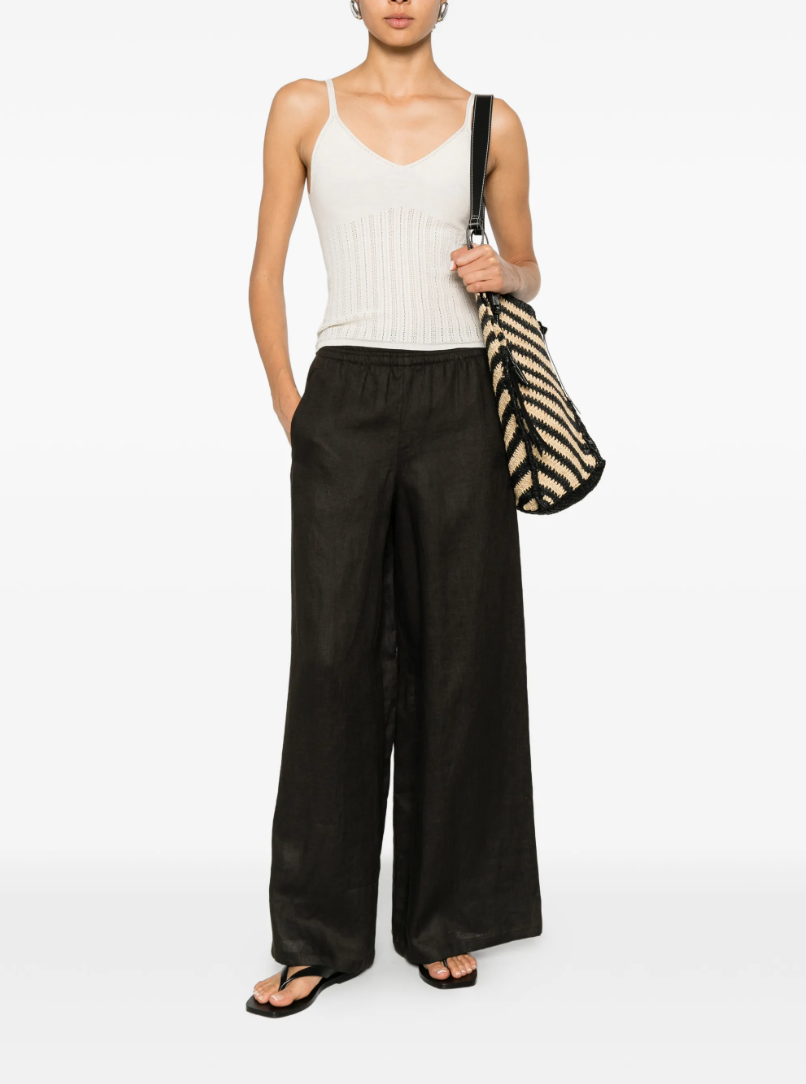 Drykorn FRANCYANE_2 knit top in coconut milk with spaghetti straps, V-neck, and slim fit in 100% cotton.