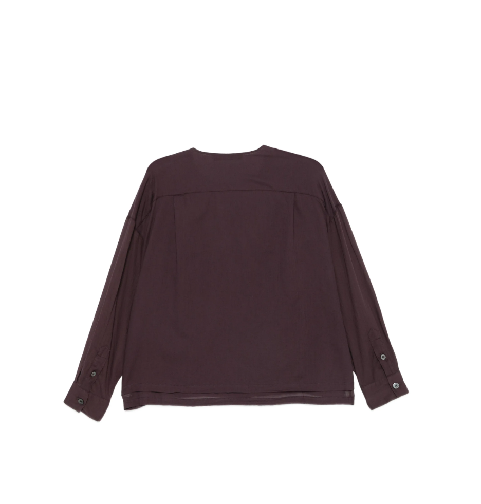 Tela dark purple shirt with button closure, long sleeves, and layered-look hem.