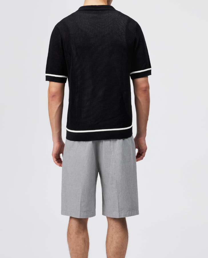 Black FLAVIRO short-sleeve knit shirt by Drykorn in relaxed fit with contrast stripes and 100% cotton for modern casual style.