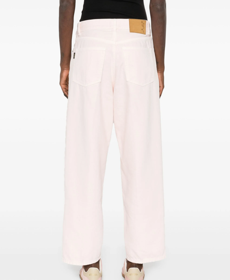 Haikure Betty jeans in soft ecru pink made from organic cotton with five-pocket design.
