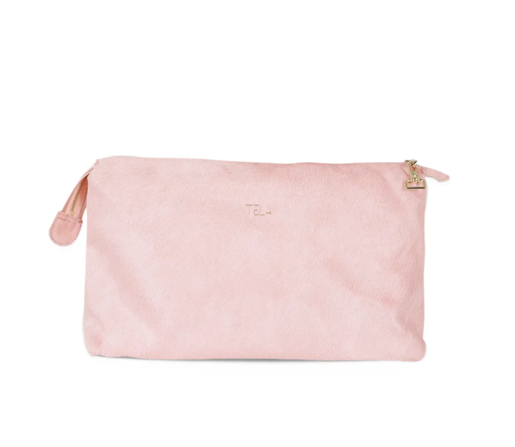 TELA KAORI Clutch Bag in Pink, crafted from 100% goatskin with a luxurious hair-on finish, gold-tone hardware and zip closure.
