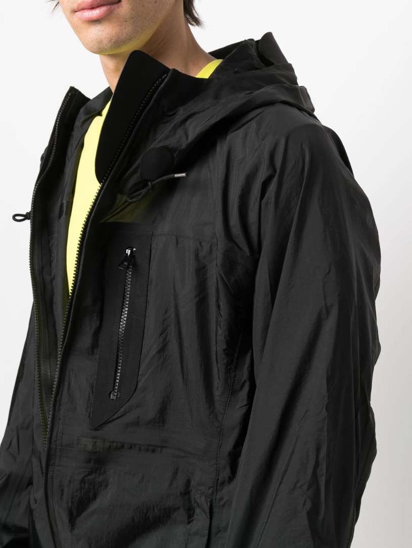 Ten C Wind Combo Bonded Jacket in black with nylon ripstop, OJJ fabric, and lightweight design.