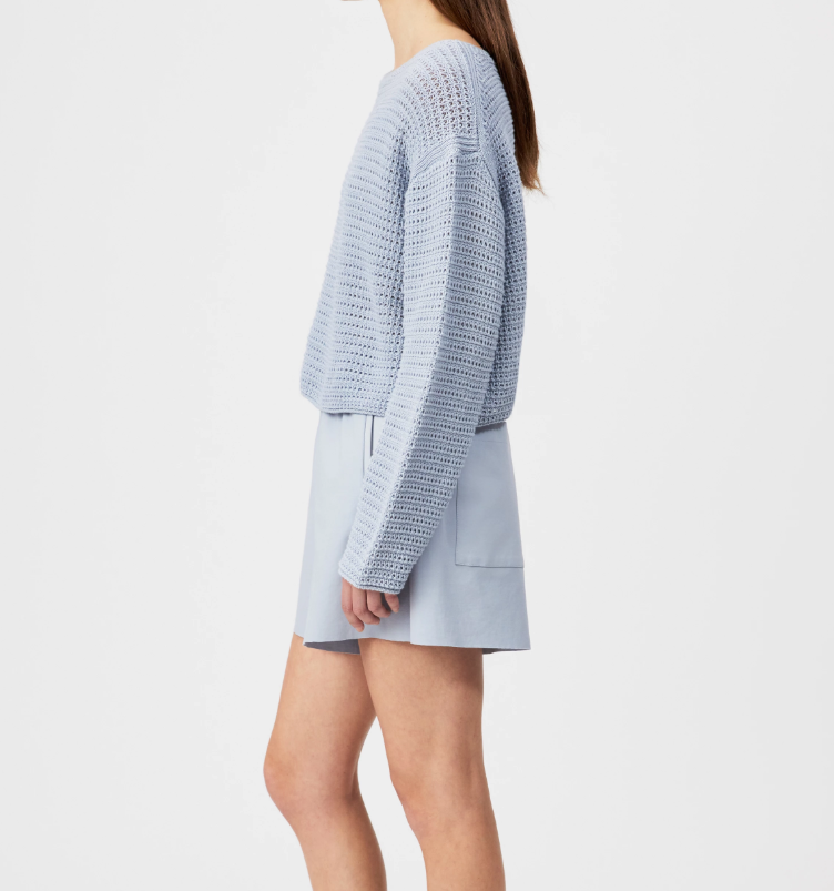 Blue cropped oversized sweater by Drykorn with boat neckline and chunky cotton knit for relaxed contemporary style.