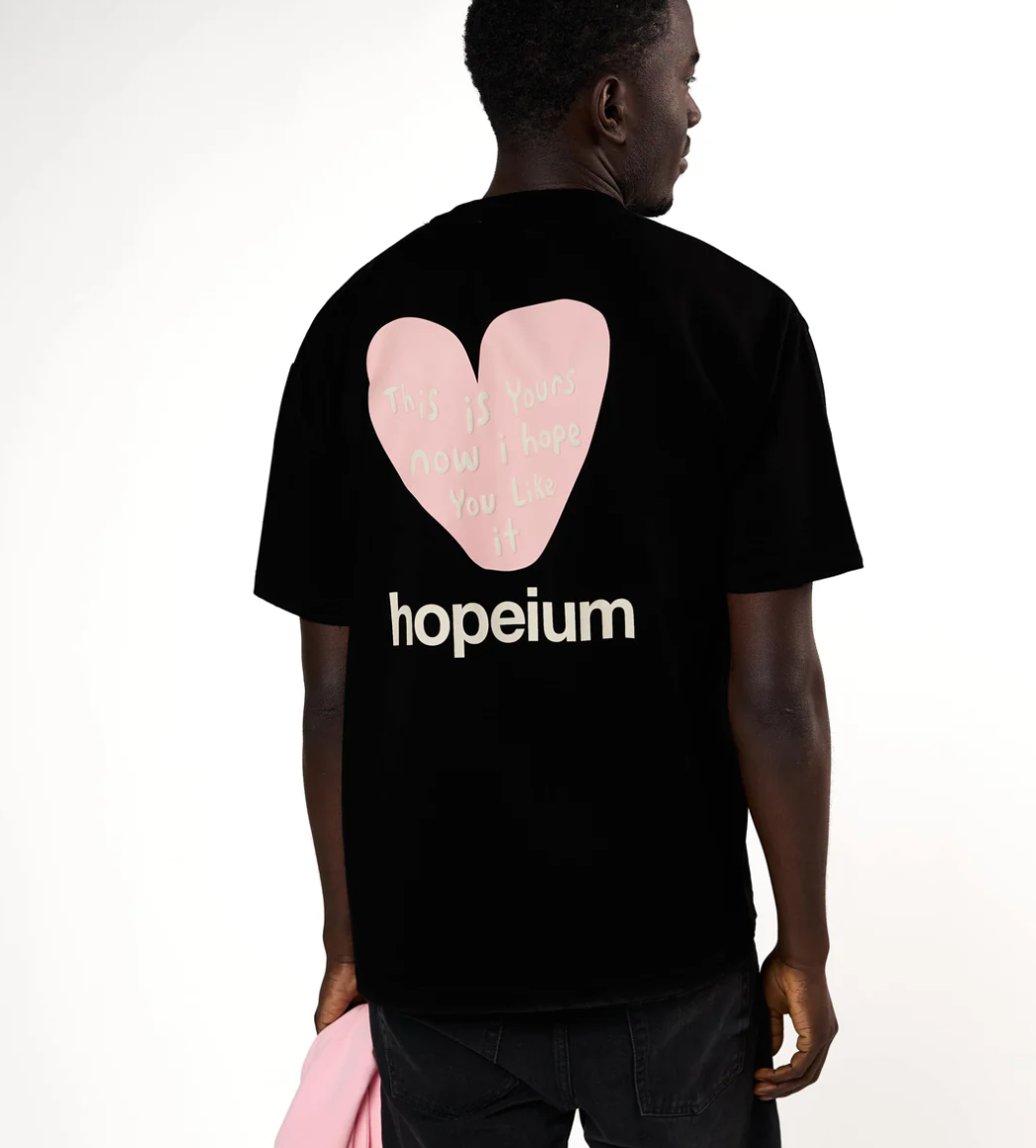 HOPEIUM men’s “THIS IS YOURS NOW” T-shirt in black with heart print, logo detail, and oversized fit.