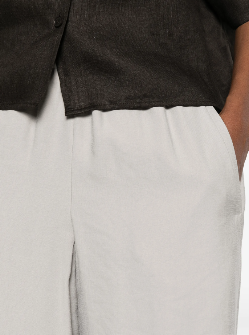 Drykorn CEILING trousers in drizzle with relaxed fit, low waist, and fluid modal fabric.