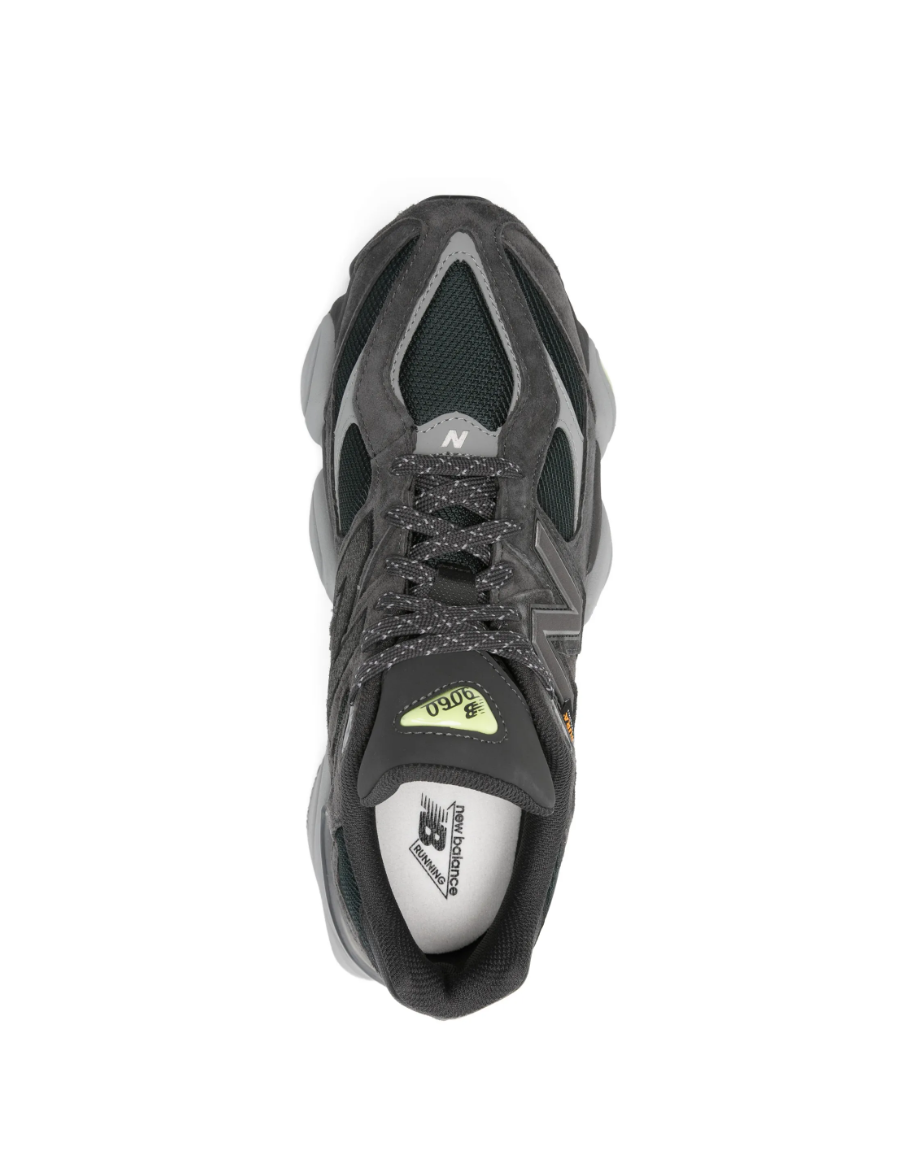 New Balance 9060 sneakers for men in Black Cement Dry Lime with mesh and suede upper and chunky sole.