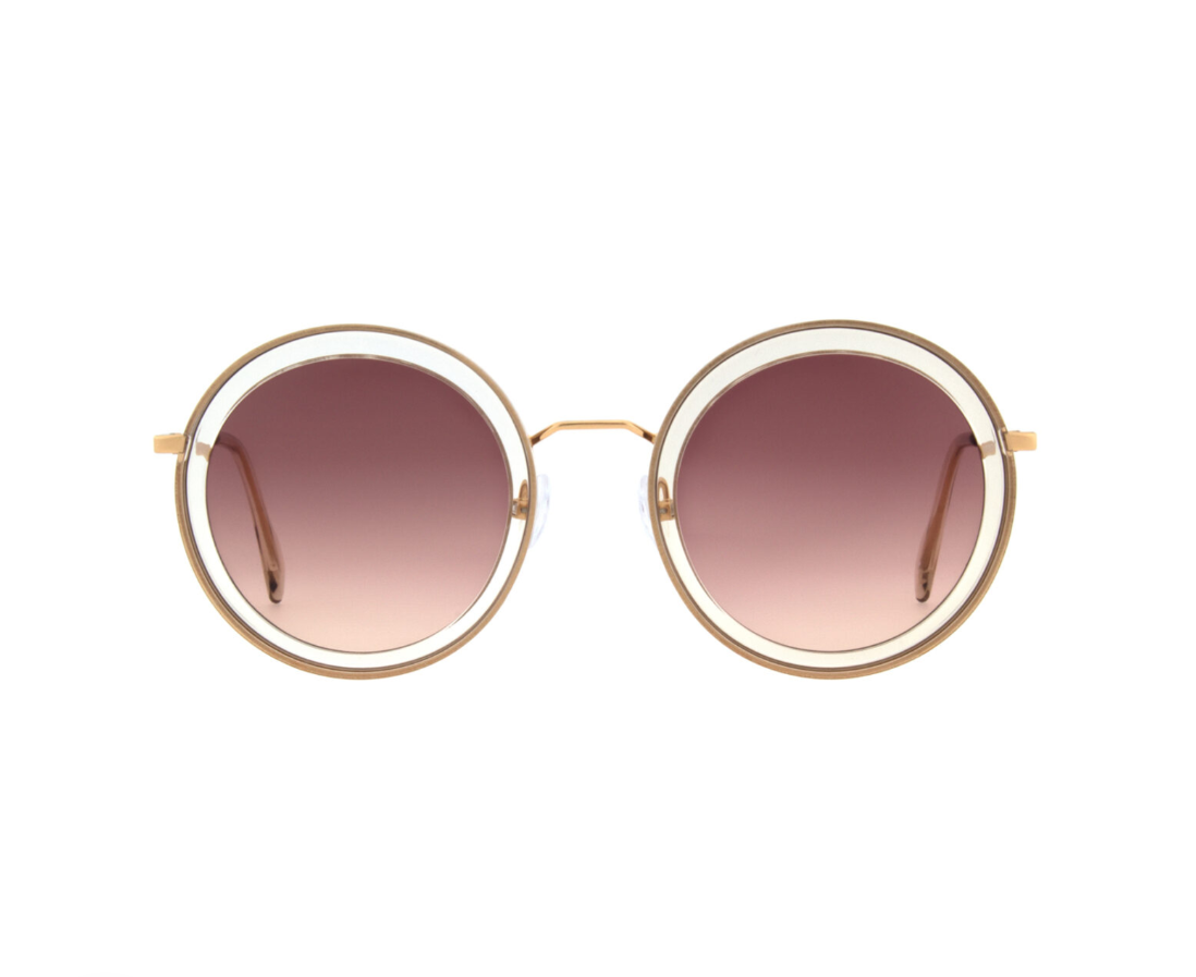 Andy Wolf LISS sunglasses in crystal with rose gold metal and round shape.
