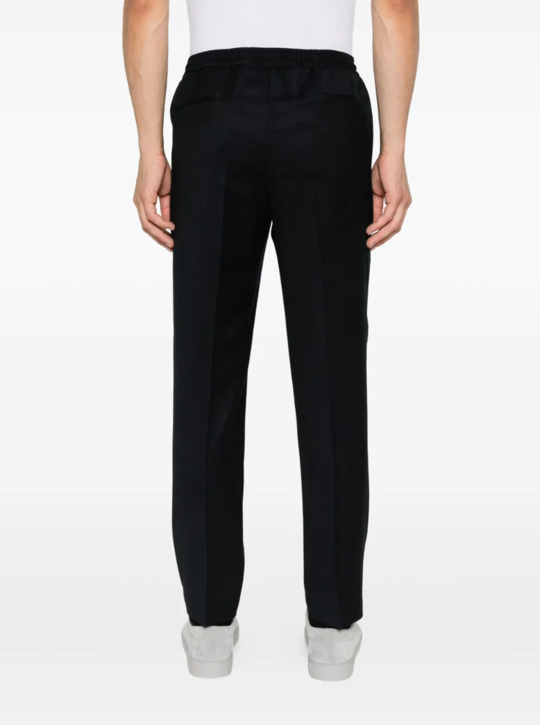 Briglia 1949 Wimbledon Tapered Trousers for men in Black, crafted from virgin wool with pressed creases and a drawstring waistband.