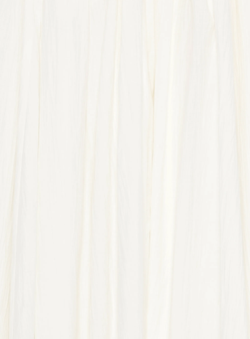 Natural white pleated maxi skirt by Tela, made in Italy with elastic waistband for a flowing, elegant silhouette.