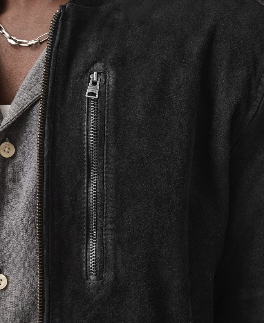 AllSaints KEMBLE Suede Bomber Jacket in black with zip closure, ribbed trims, chest pocket, and recycled lining.
