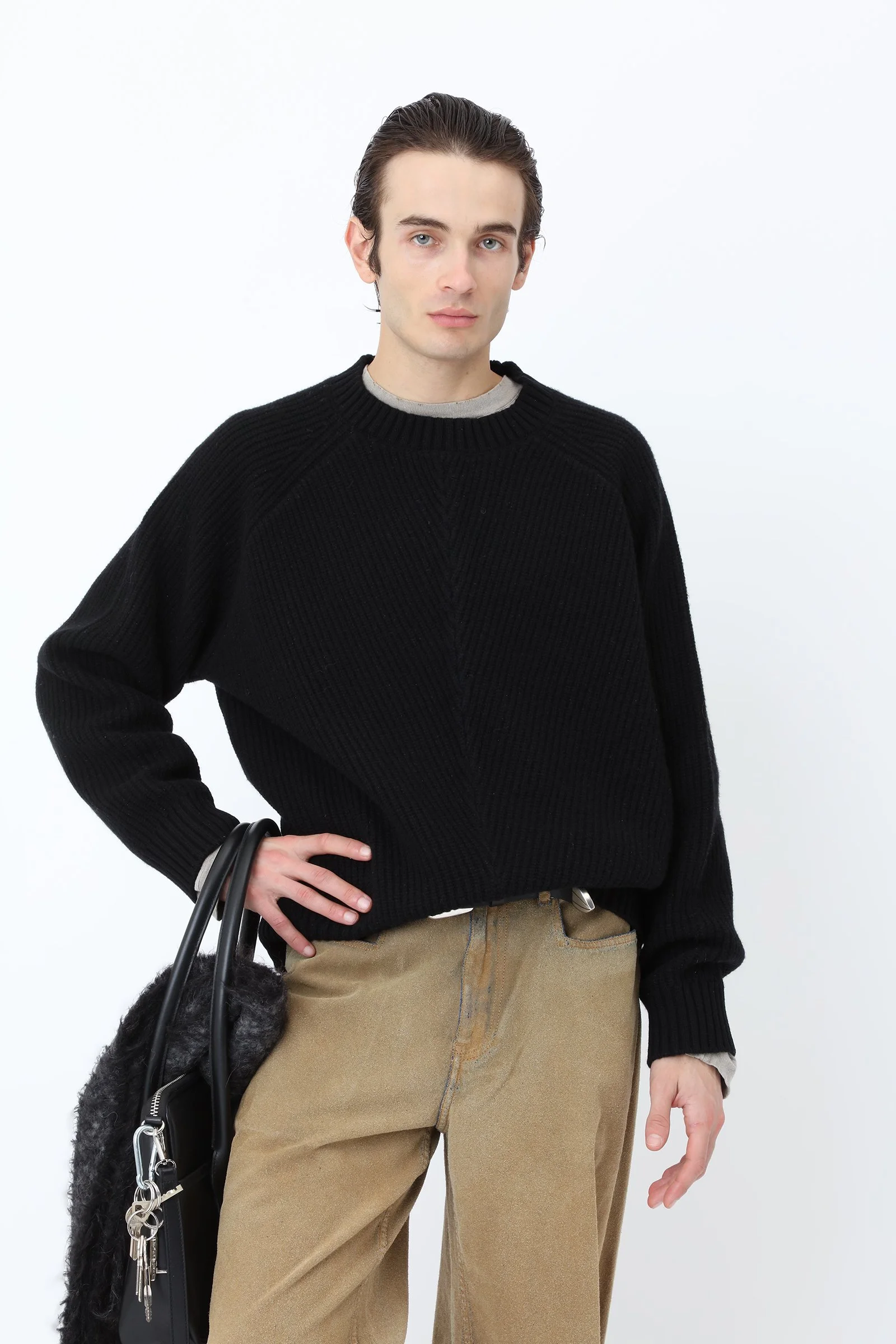 Won Hundred BENTLY Knit Sweater for men in Black, crafted from a soft lambswool blend with raglan shoulders and subtle cutline detailing.