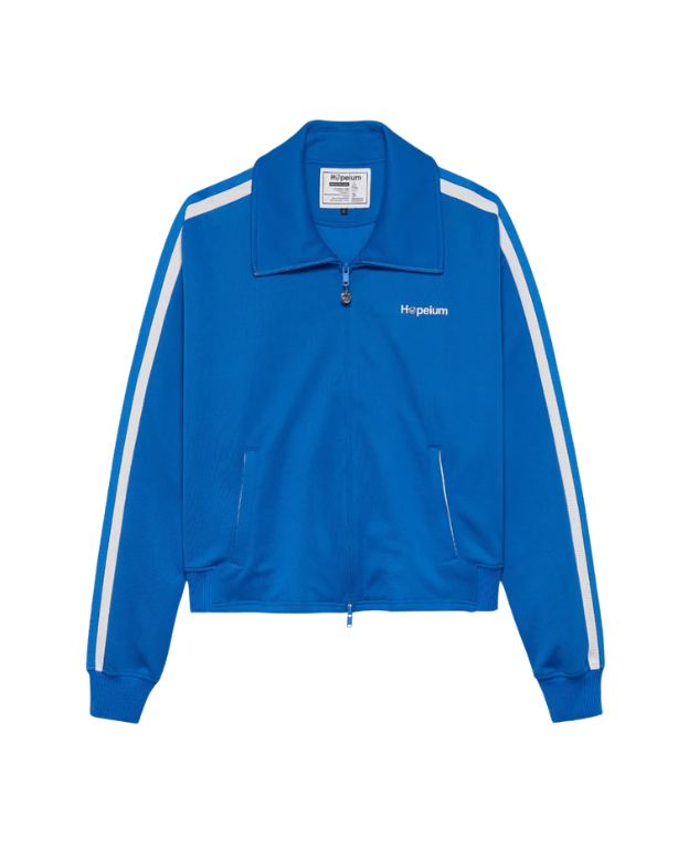 HOPEIUM track jacket in cobalt with cropped oversized fit, stripe sleeves, and logo details.