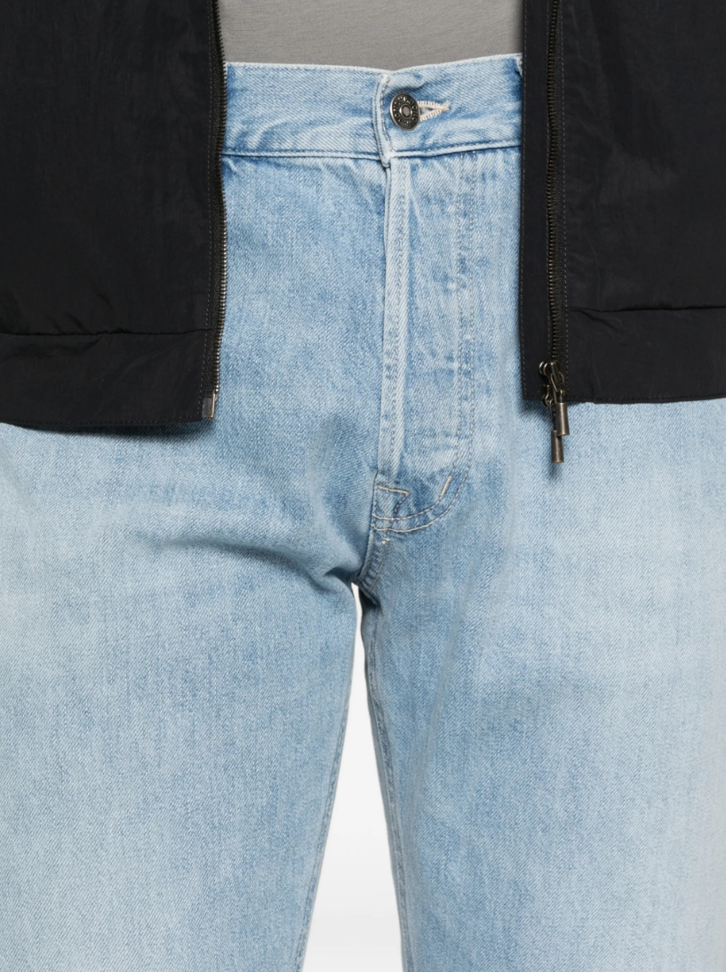 Dondup straight-leg jeans in light blue faded wash with button fly and classic five-pocket design.