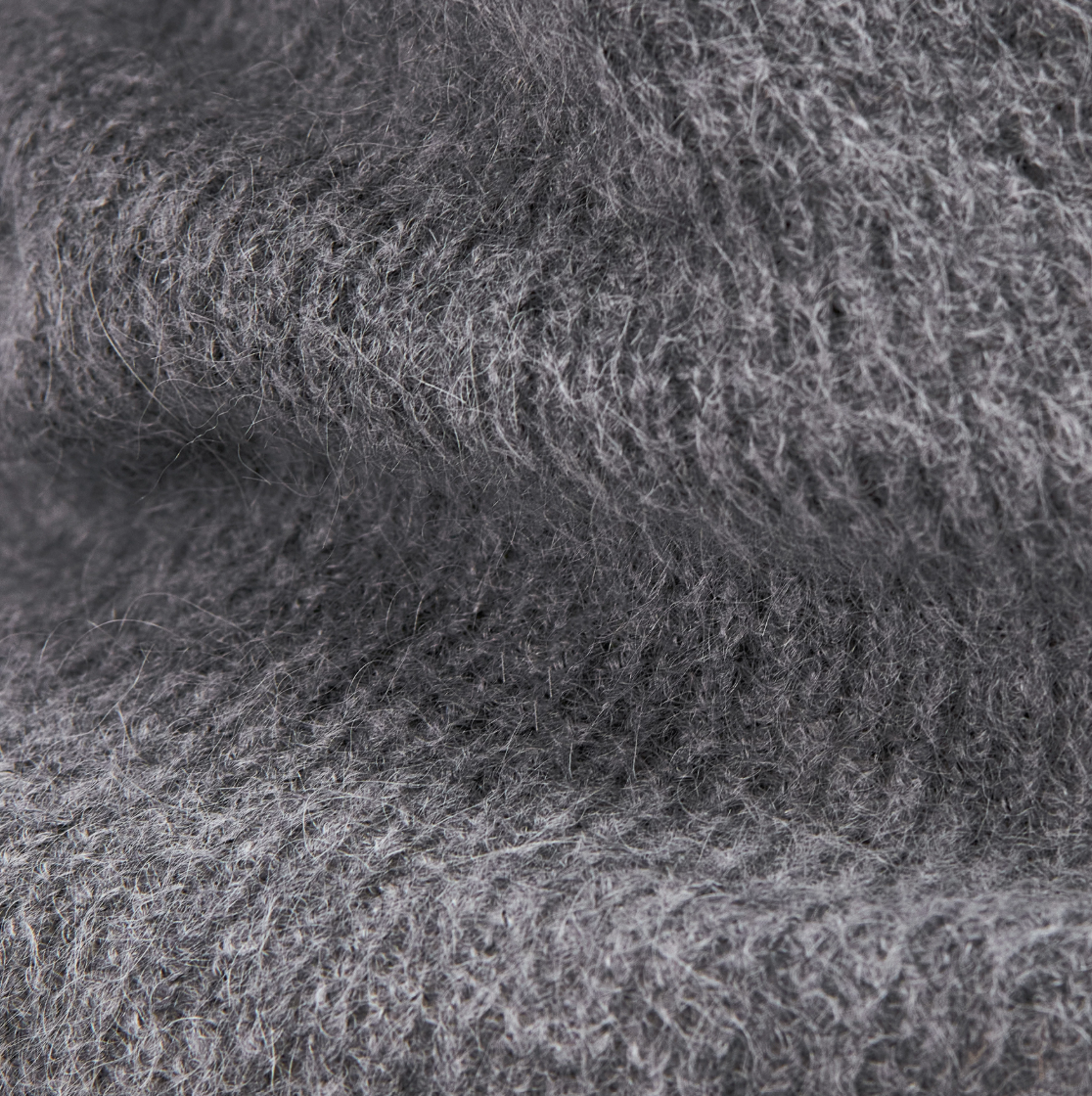 Drykorn LOBAIA Wrap Knit for women in Rainy Day Grey with an asymmetric wrap design, deep V-neck and soft alpaca blend.