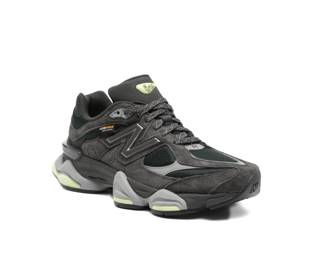 New Balance 9060 sneakers for men in Black Cement Dry Lime with mesh and suede upper and chunky sole.