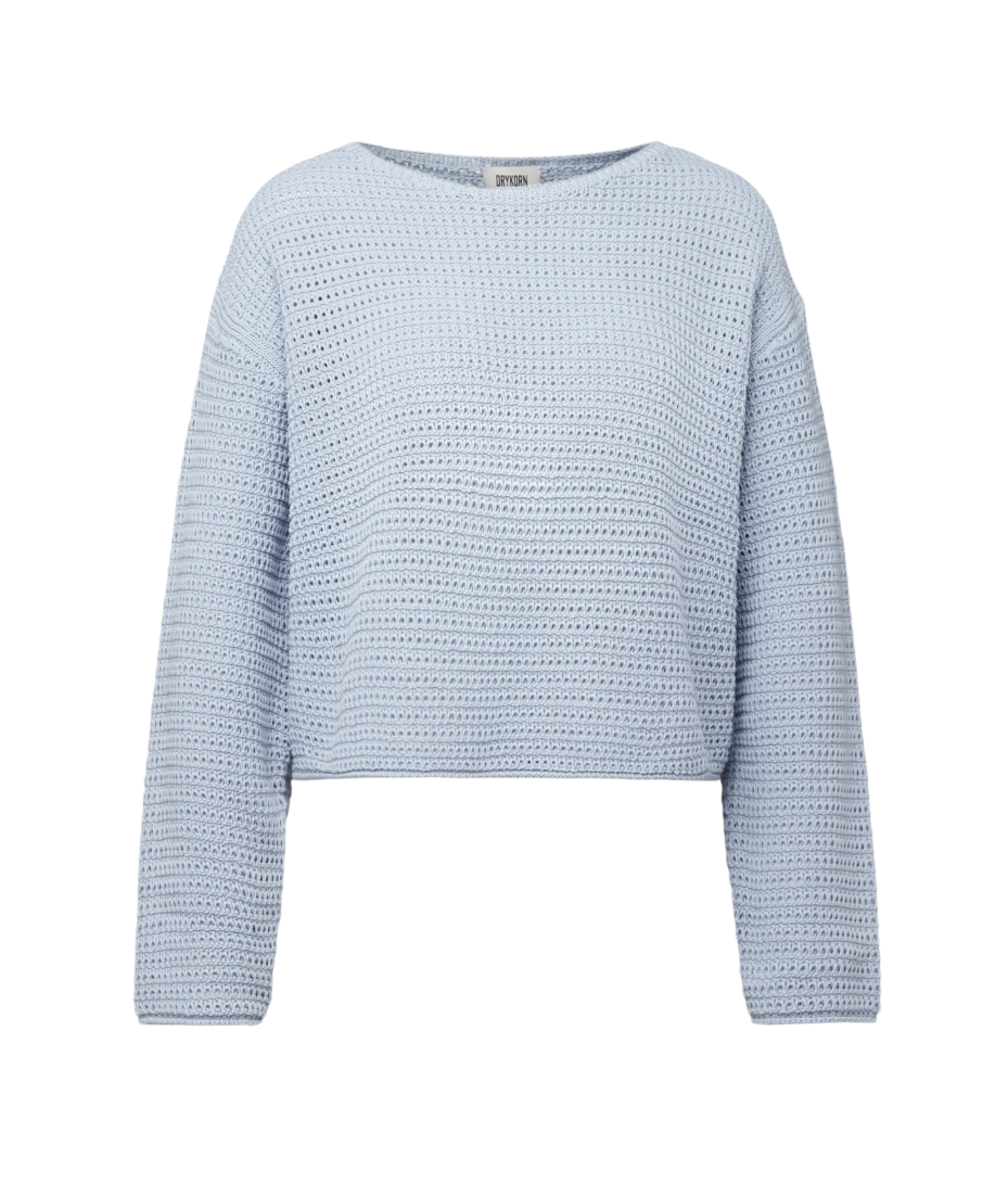 Blue cropped oversized sweater by Drykorn with boat neckline and chunky cotton knit for relaxed contemporary style.