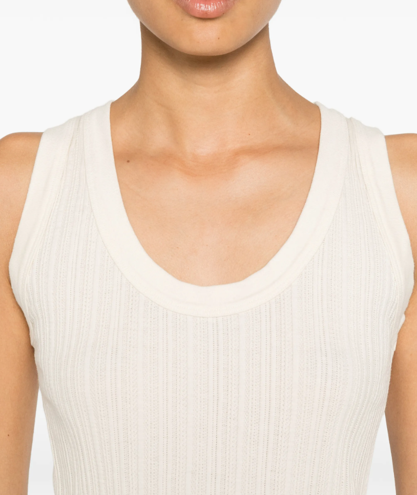 Drykorn SULENA ribbed top in off white with scoop neck, sleeveless design, and slim fit in 100% cotton.