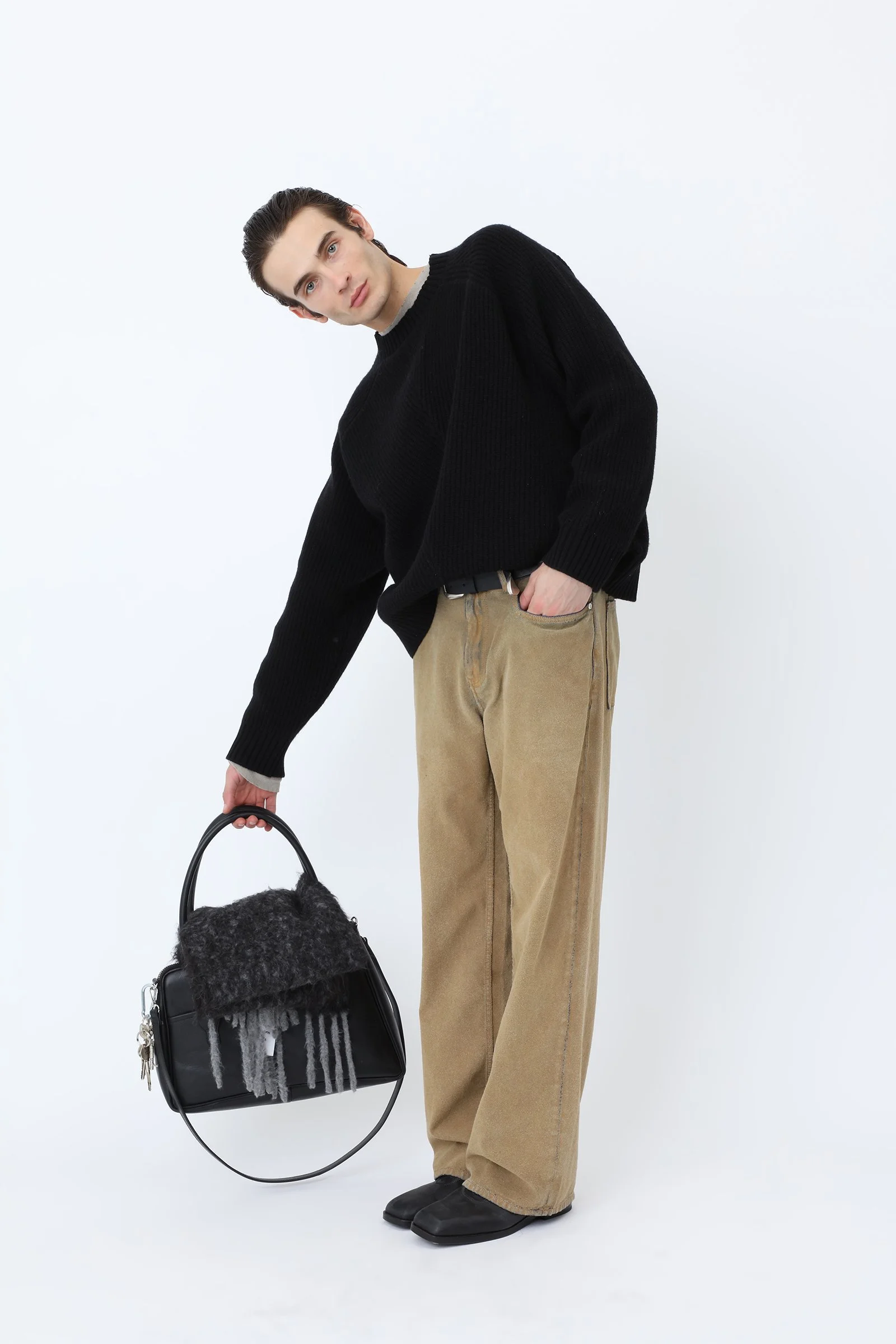 Won Hundred BENTLY Knit Sweater for men in Black, crafted from a soft lambswool blend with raglan shoulders and subtle cutline detailing.