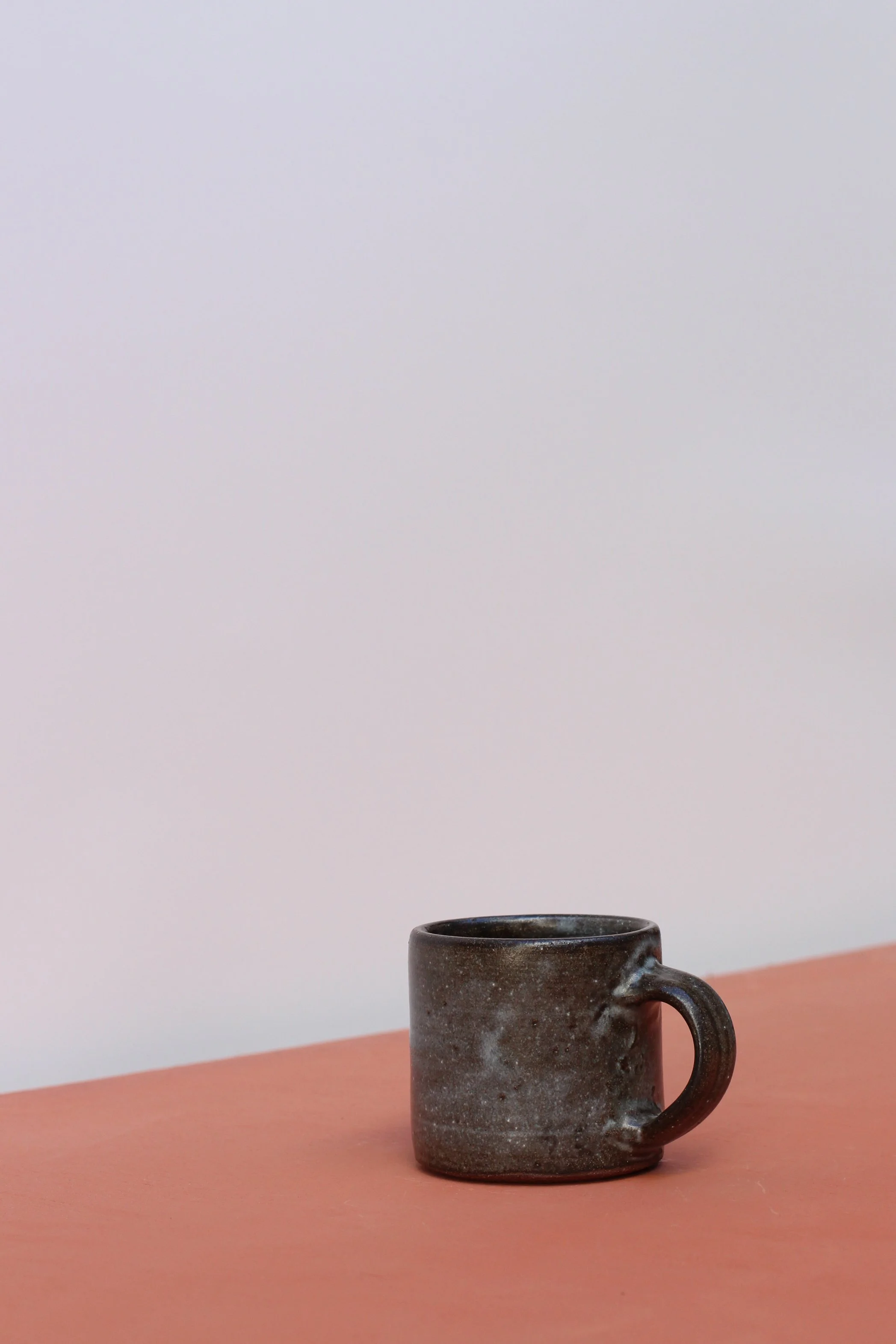 Dark blue straight sided mug