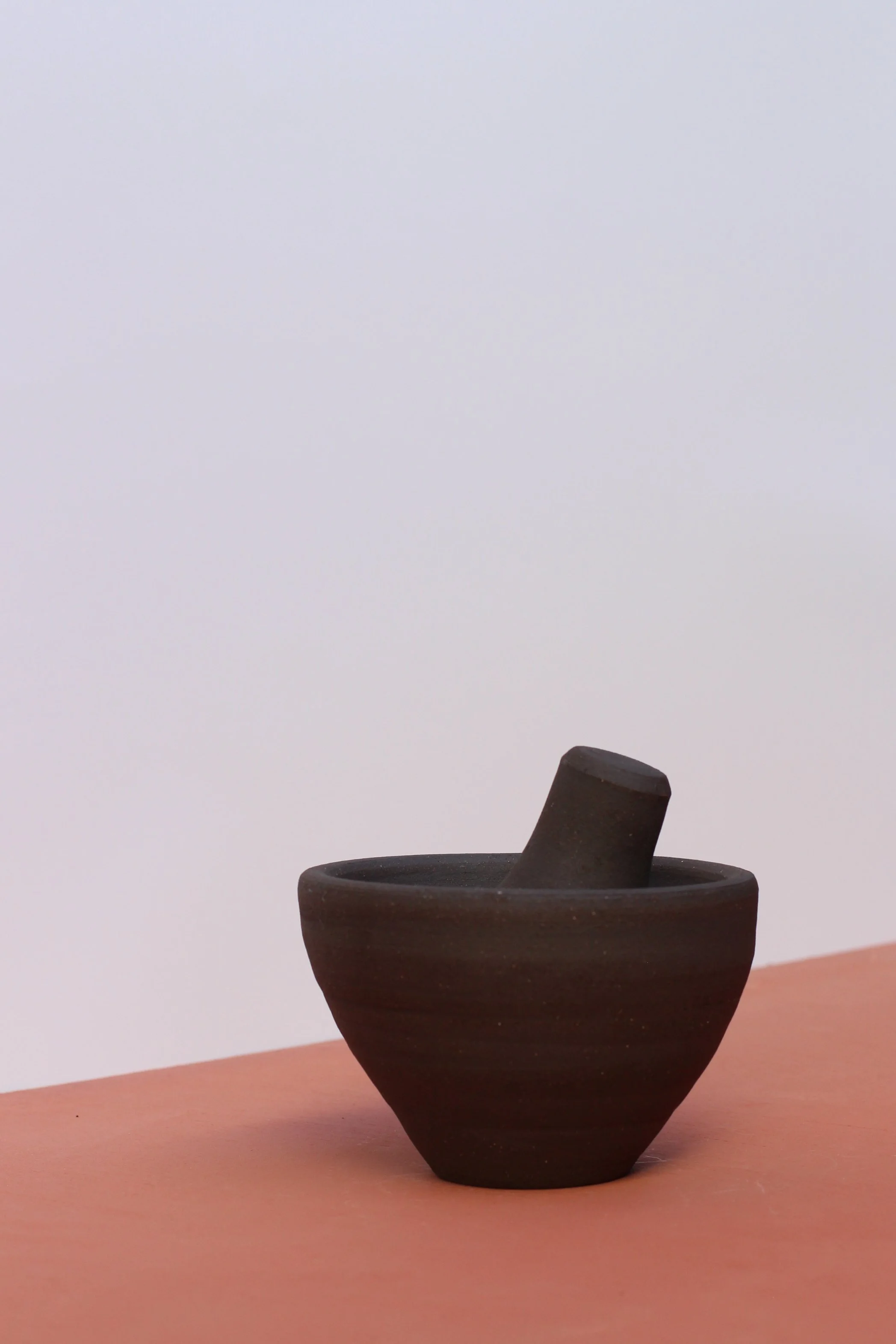 Black mortar and pestle