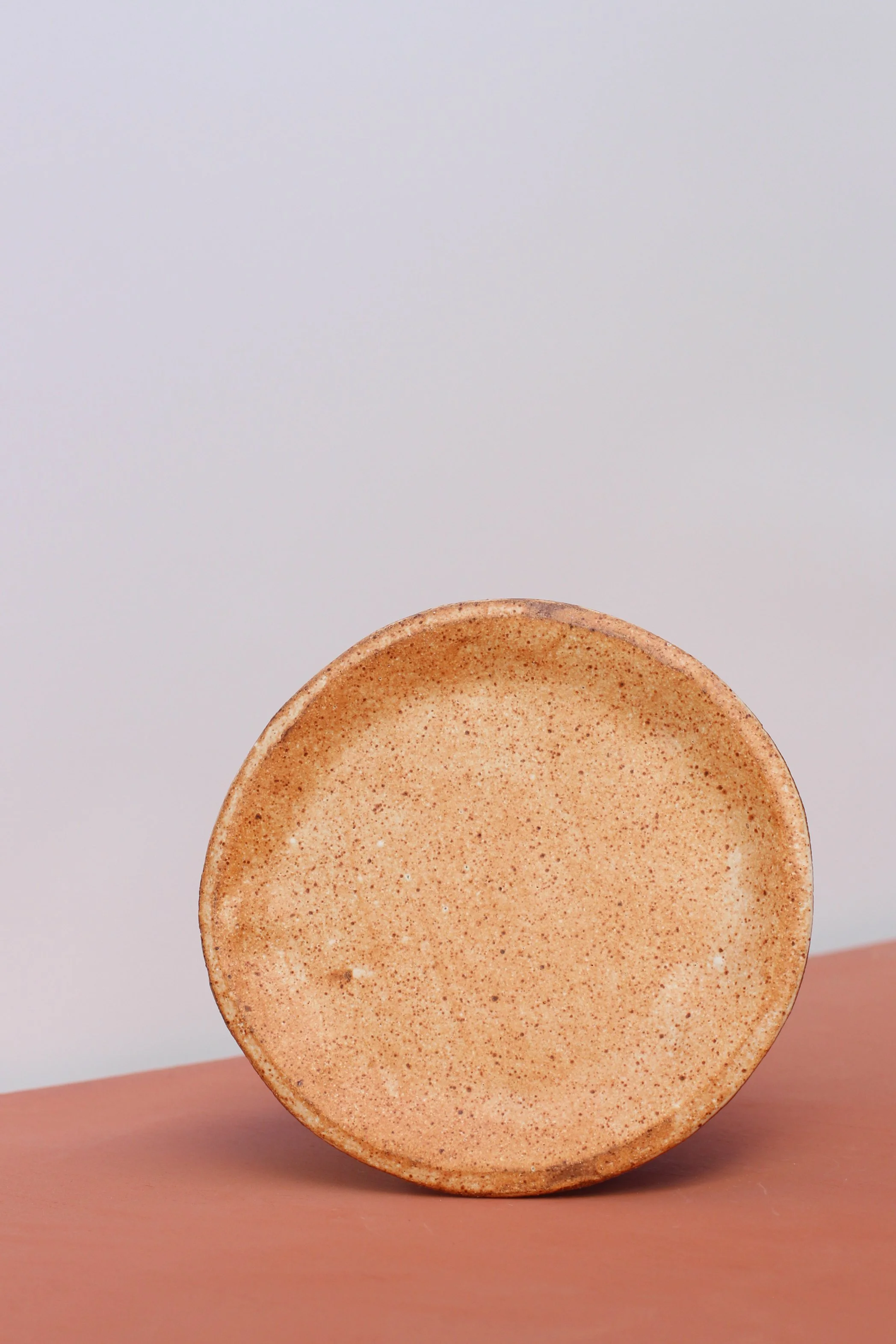 Light orange pastry plate