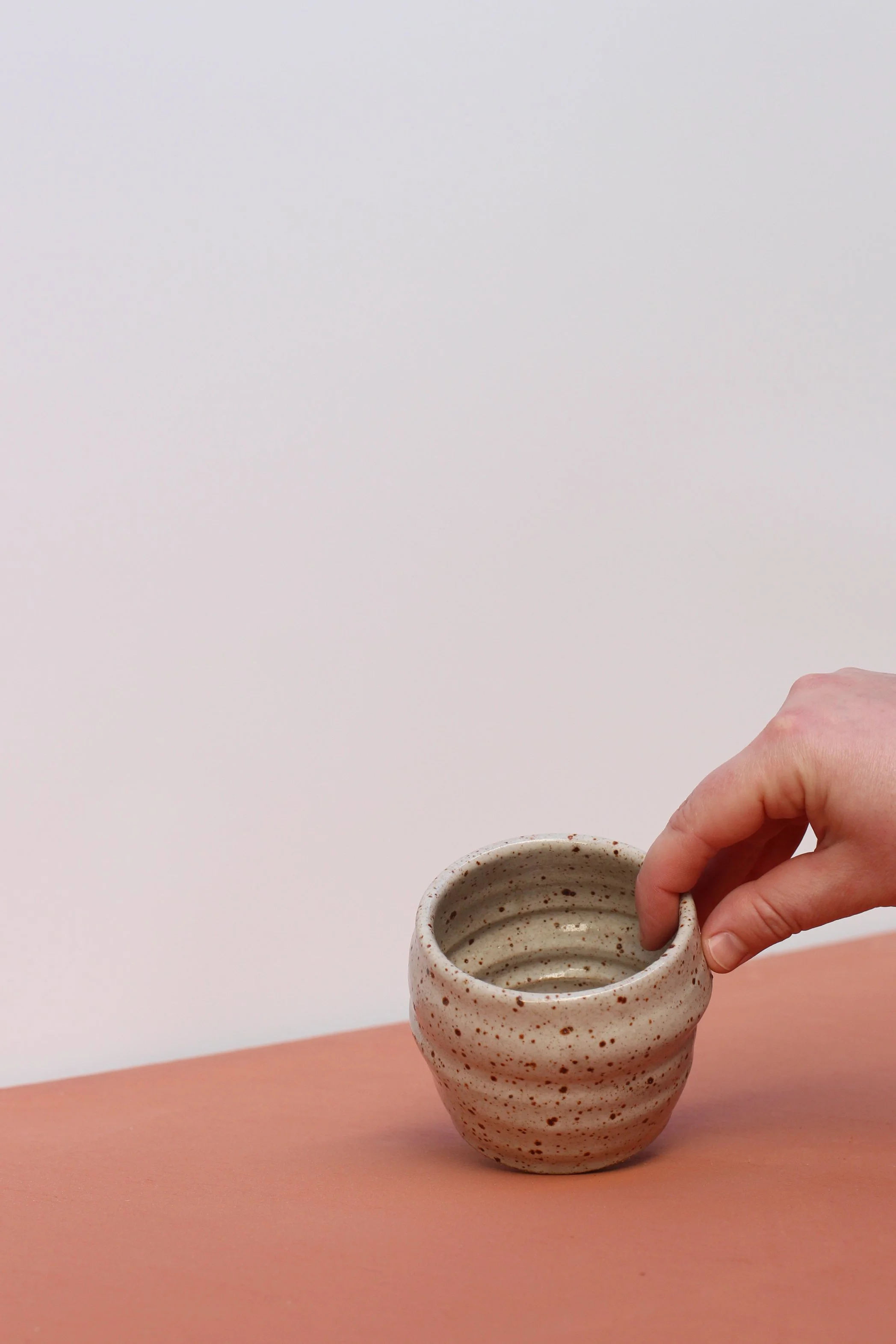 Specked stoneware beaker