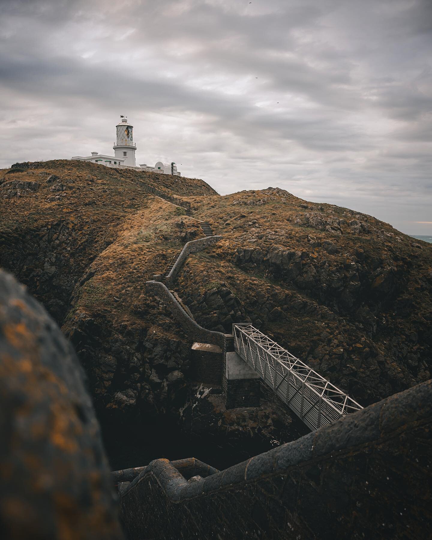 The stairs to Strumble Head Ligthouse. I wonder what it is about lighthouses that&rsquo;s so intriguing? 

@nikoneurope Z9 &amp; 24-70 2.8 S
1/100 &bull; f5.6 &bull; iso400

#visitwales #visitpembrokeshire #lighthouse #thewalescollective #walescoast 