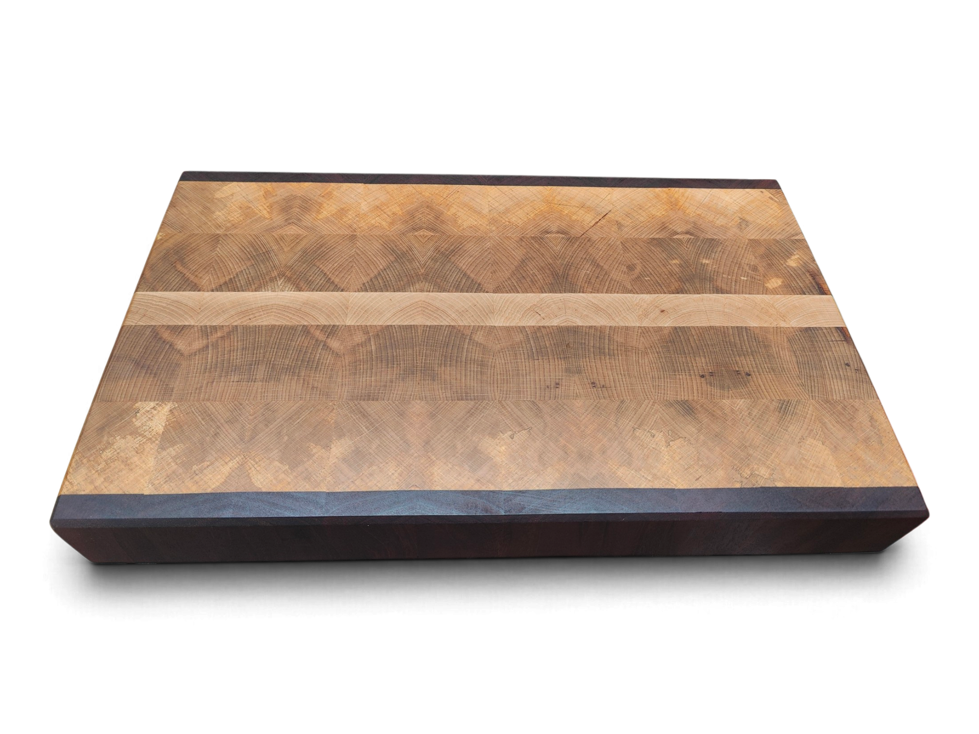 Mahogany and beech contrast across an end grain board face