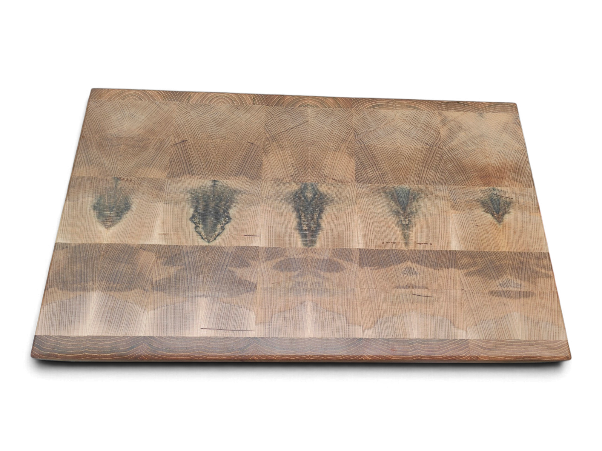 Flame figure and light spalting in Irish beech end grain