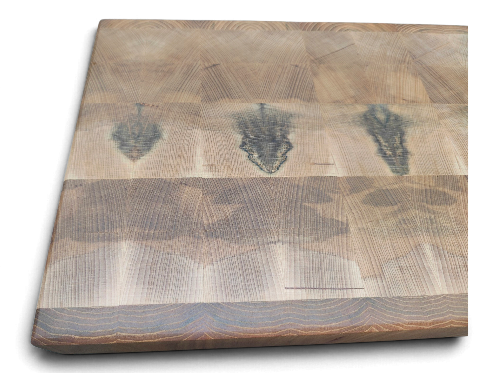 Spalt lines across a flame beech end grain board face