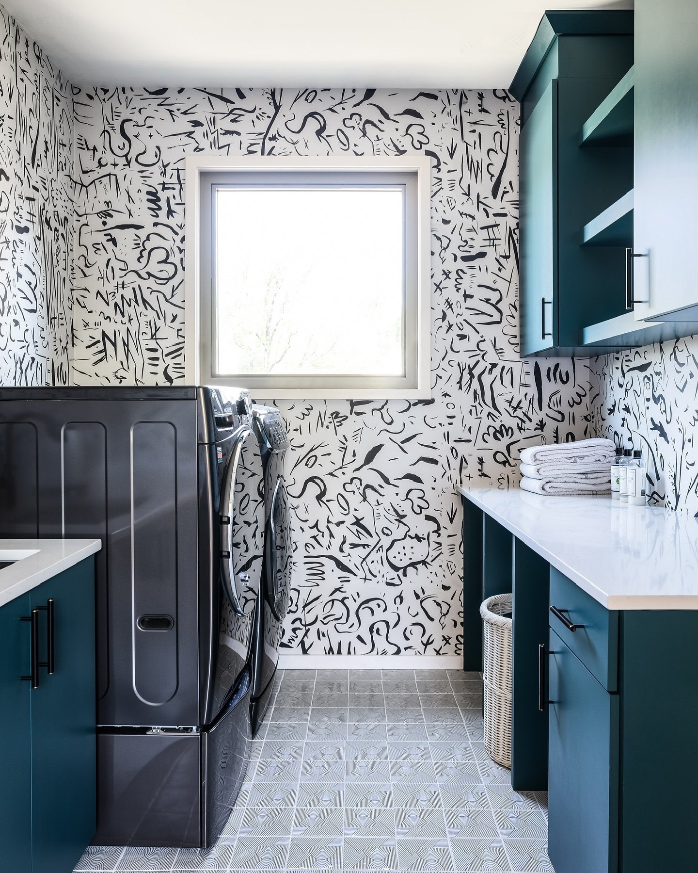 Who said laundry rooms have to be drab? 

Inject some fun into your everyday tasks with tasteful, eye-catching colors and bold patterns that make sorting, washing, and folding a treat for the senses. 

With practical, contemporary built-ins, you can 