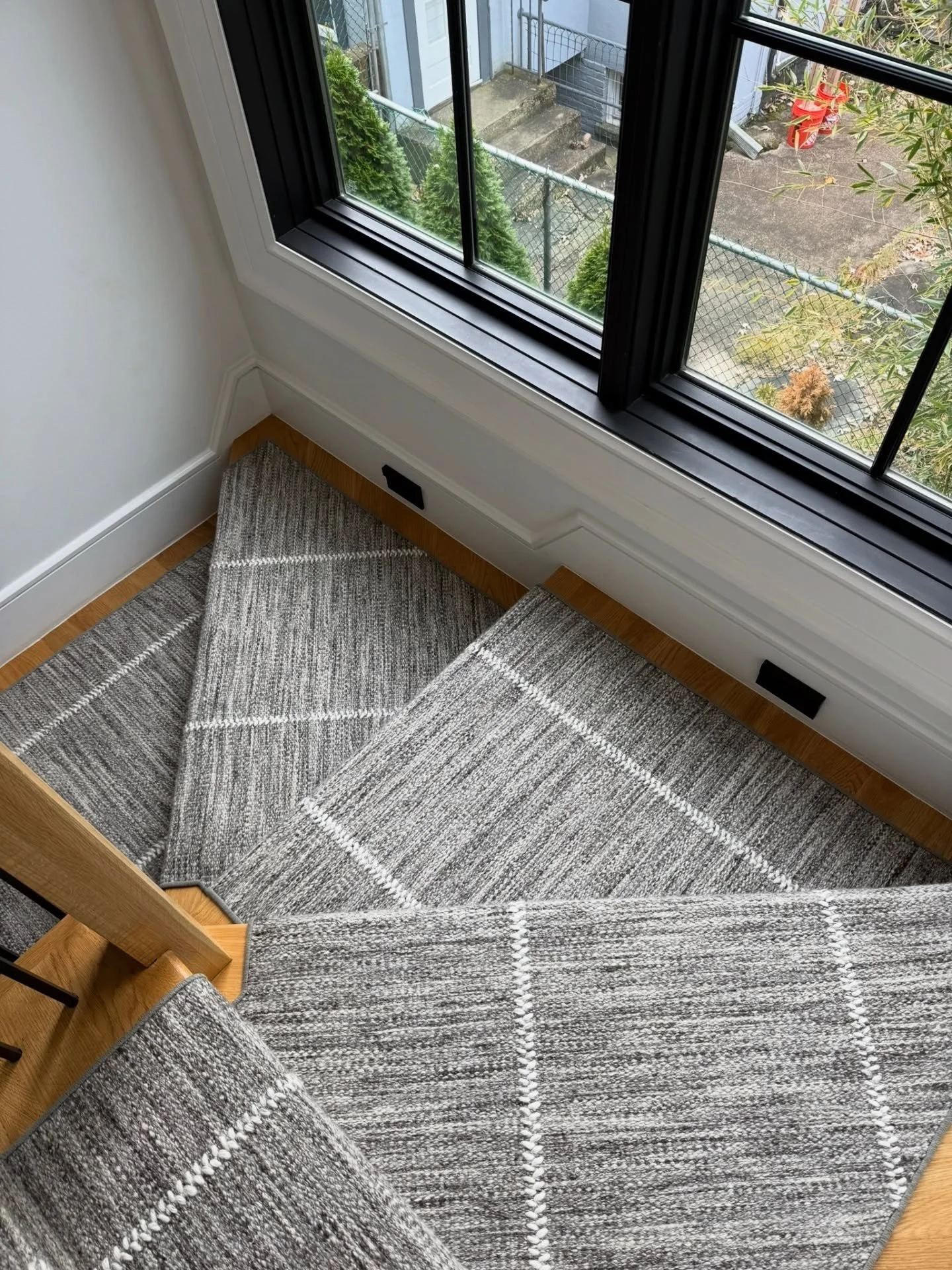 Runner installation day ✨ Loving how this tailored pattern adds warmth, texture, and polish to the stairwell &mdash; the perfect finishing touch to tie each level together. 

#stairrunner #customrunner #patternedrunner #texturedcarpet #stairdesign #r
