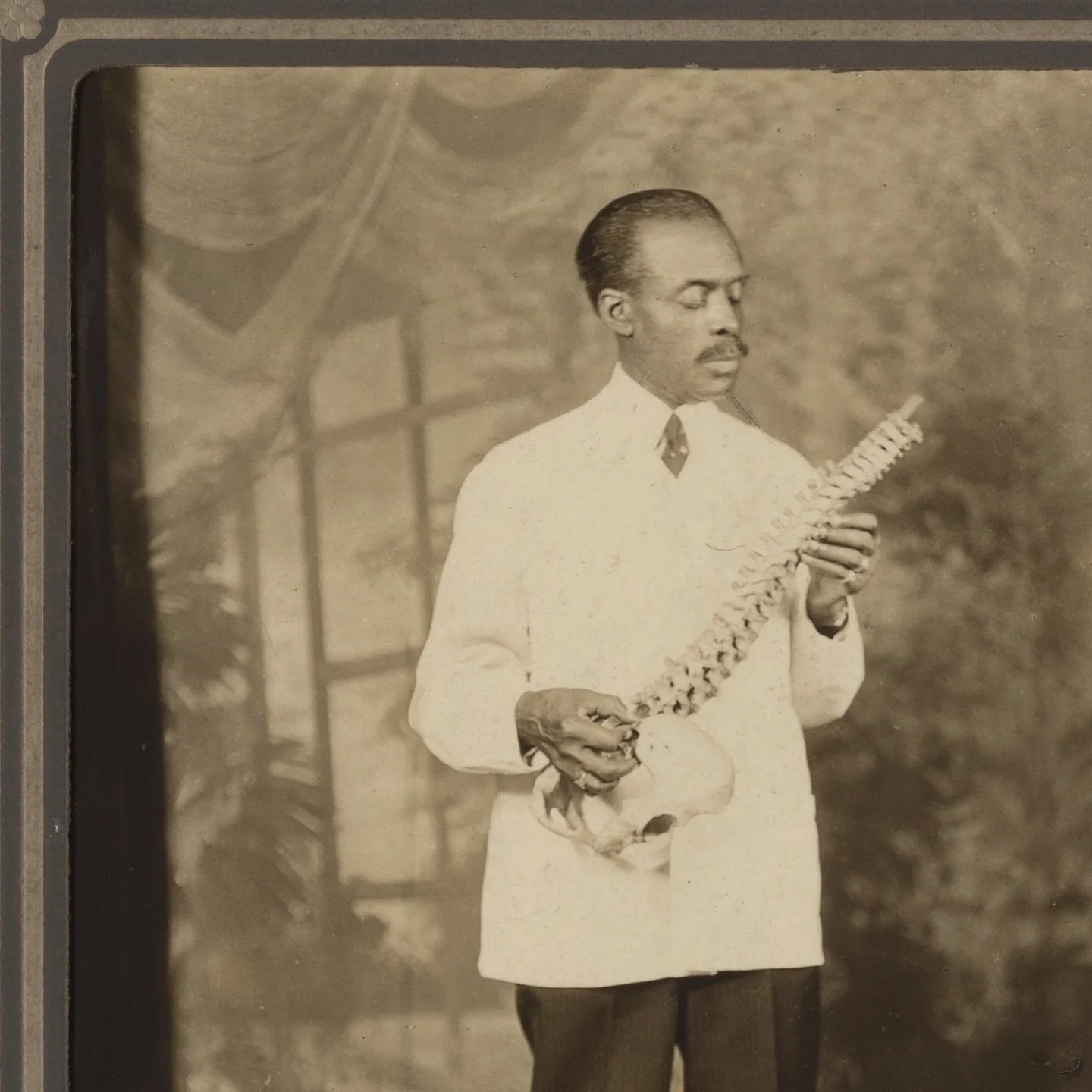 🩺 date unknown, studio portrait of a doctor holding a spinal bone.
 
{*it&rsquo;s Friday 13th. Second one in a row this year. I bet there&rsquo;s some significance with that&hellip; 🔭🪐 anywho, I was gonna make a skeleton joke but nah, just swipe a