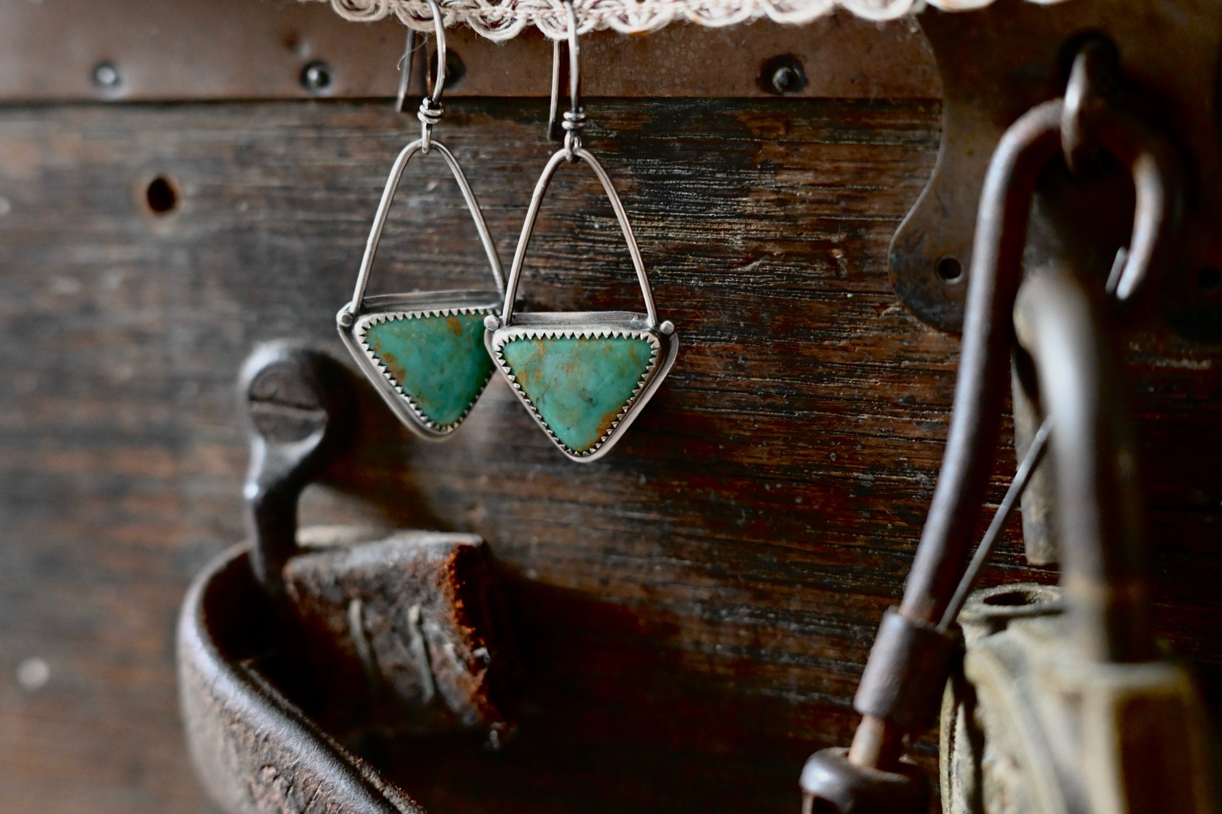 handmade bezel set metalwork earrings