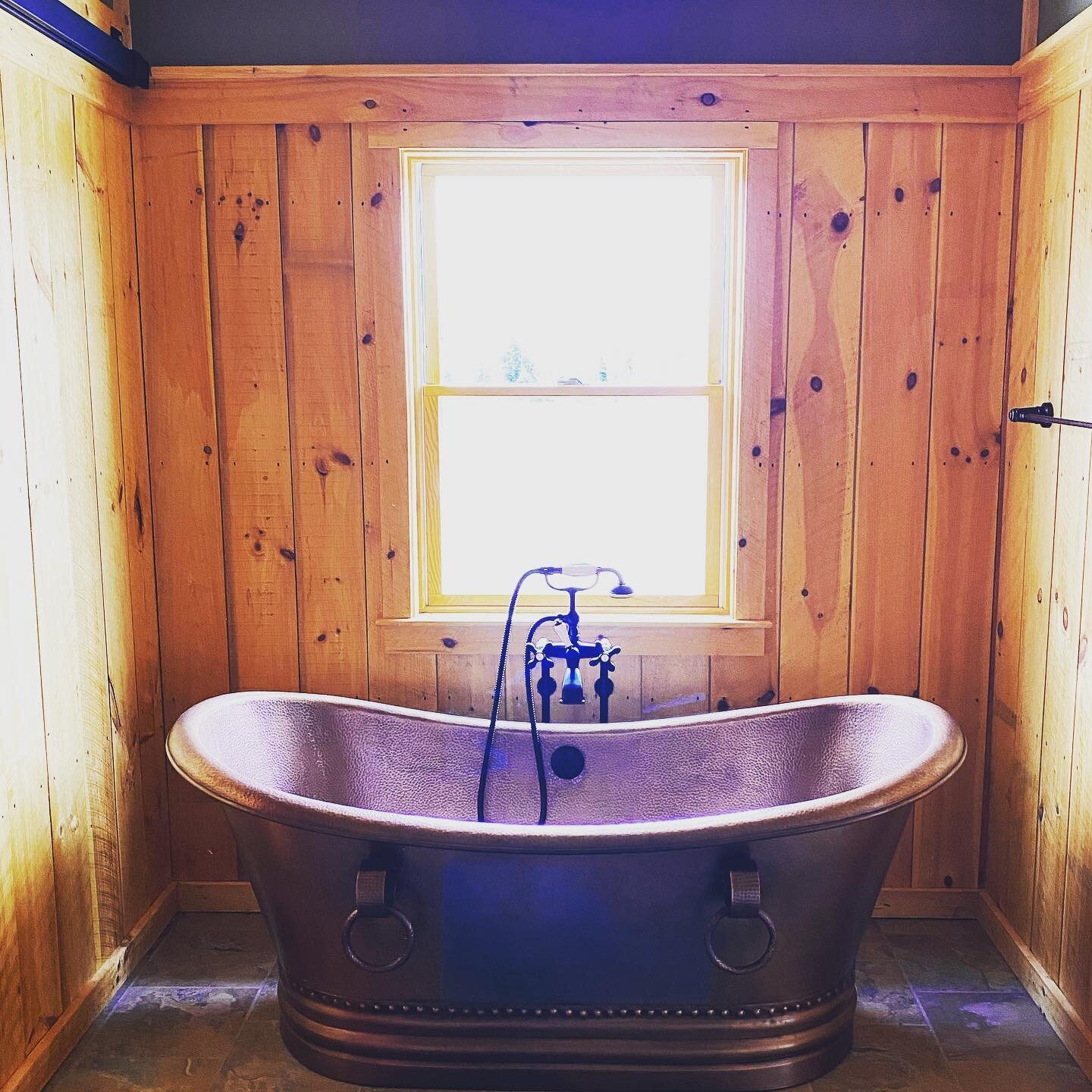 Big fat copper tub!  Another photo from our @burkesugarhouse remodel.  Lots of #customwoodworking to give the house a much warmer feel and more #vermontvibes .  Our work transformed one of the garage bays and an outdated in-law apartment into a gorge