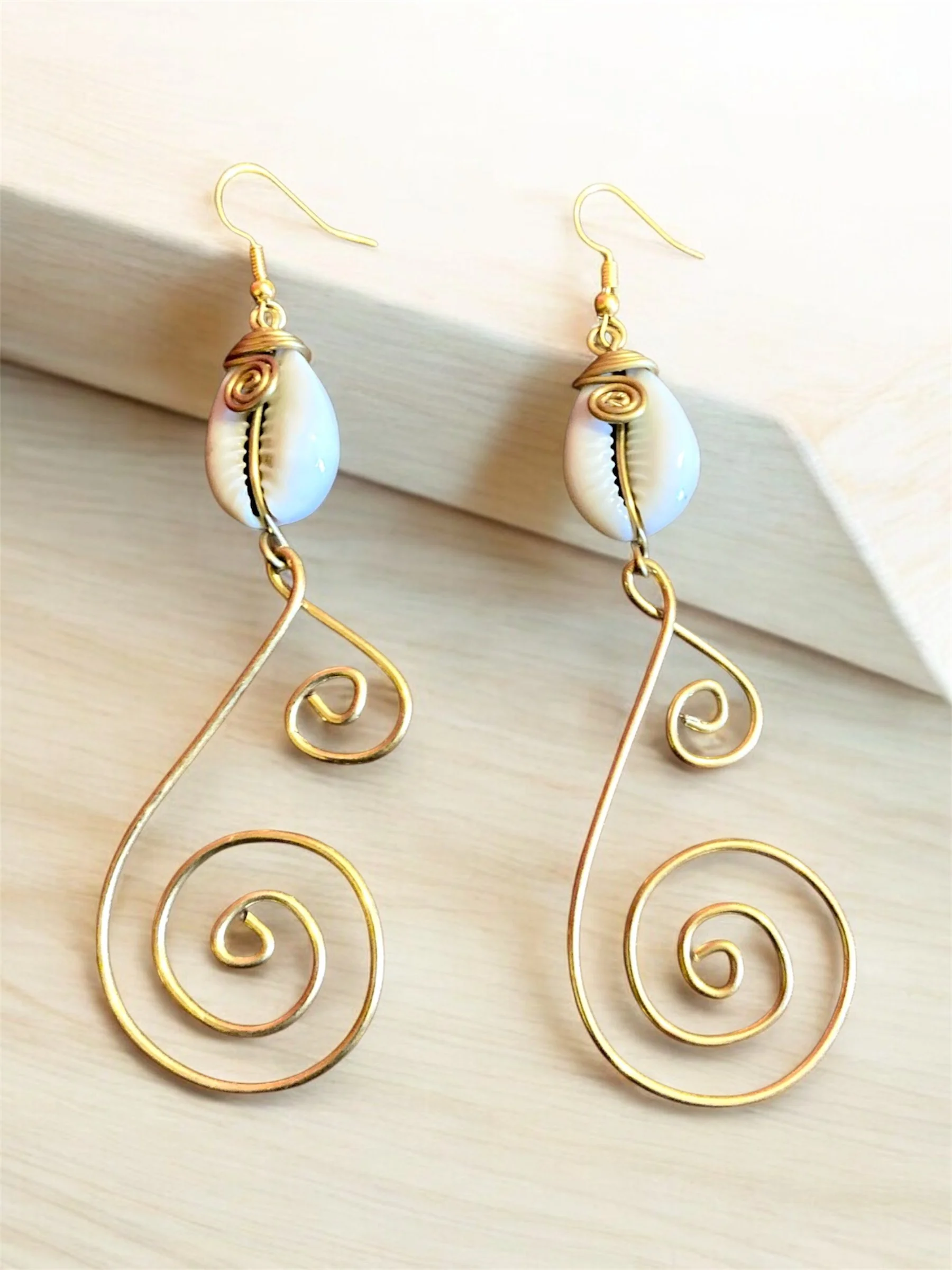 Swirl cowrie pendant earrings 1.7 - Style Me African